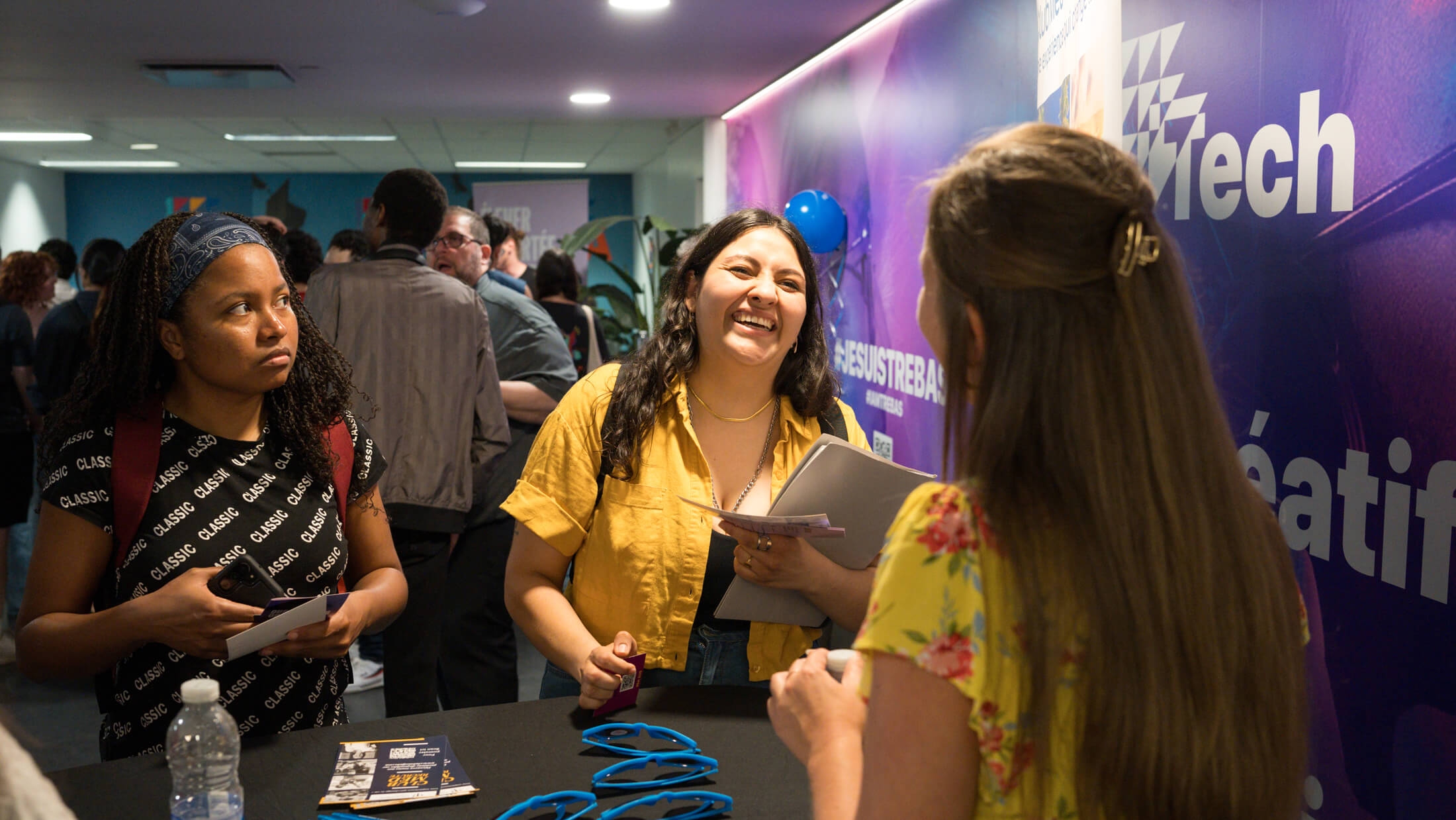 student interacting with staff